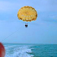 Dad way up parasailing